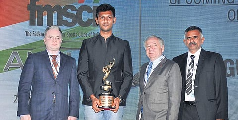Raghul Rangasamy (second left) during the FMSCI awards in Mumbai on Monday