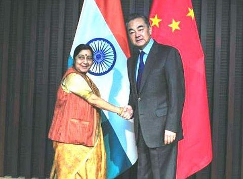 External Affairs Minister Sushma Swaraj with Chinese Foreign Minister Wang Yi (Photo | Twitter @MEAIndia)