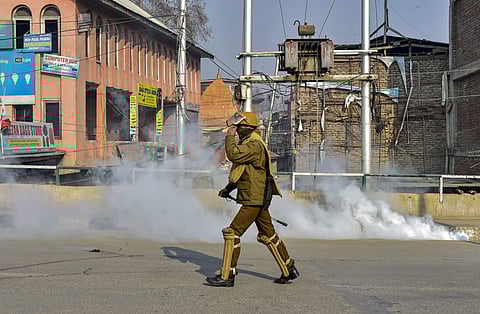 Police personnel use teargas to disperse a protest march in Jammu and Kashmir (File Photo | PTI)