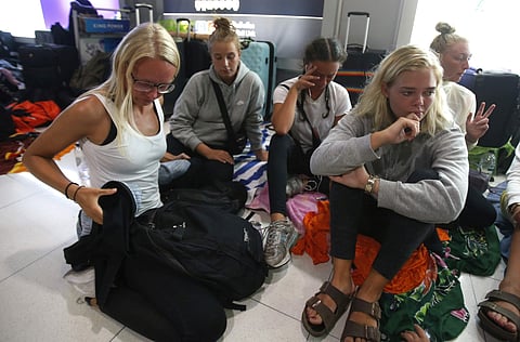 A group of 25 Danish students stay overnight at Suvarnabhumi Airport after they were unable to board a connecting flight in Bangkok, Thailand. | AP