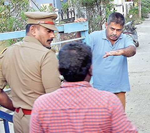 Police personnel at the entrance of Jal Vayu Vihar in Madambakkam near Selaiyur where the house of Wing Commander Abhinandan Varthaman’s parents is located | Martin Louis