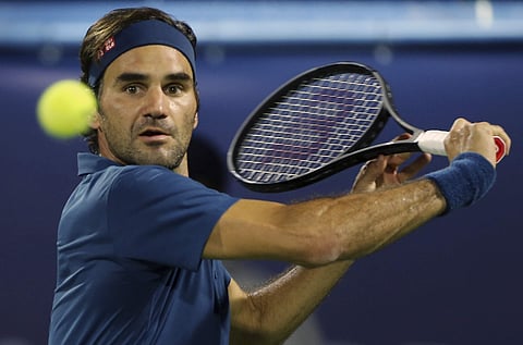 Roger Federer of Switzerland returns the ball. (Photo | AP)