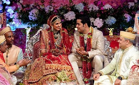 Reliance Industries scion Akash Ambani Saturday married Shloka Mehta, daughter of diamantaire Russel Mehta, at a glittering ceremony in Mumbai. The event had some top global leaders and A-listers in attendance at the high profile wedding.(Photo: Twitter)