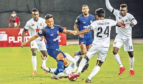 Chennaiyin’s Jeje Lalpekhlua (C) in action against Colombo FC in Ahmedabad on Wednesday