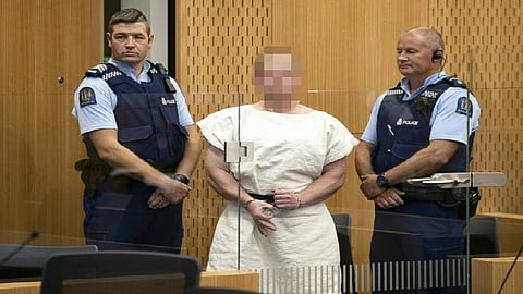 Brenton Tarrant stands in the dock as he is charged with murder following the deaths of 49 people in the New Zealand mosque shooting massacre on 15 March 2019. (Photo | AFP)