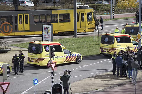 Ambulances are seen next to a tram after a shooting in Utrecht, Netherlands. (AP photo)