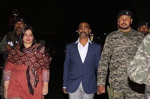 IAF pilot Wing Commander Abhinandan Varthaman C as he is released by Pakistan authorities at Wagah border on the Pakistani side Friday March 1 2019. | PTI