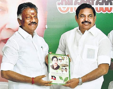AIADMK co-ordinator O Panneerselvam handsover a copy of the manifesto for the  LS elections to joint co-ordinator Edappadi K Palaniswami on Tuesday | P Jawahar