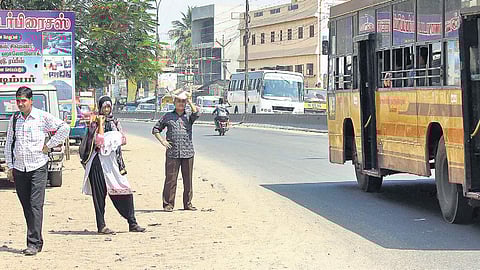  Several bus shelters are damaged or encroached upon by vendors, or other obstructions, forcing passengers to wait on the road.(Representative Image)
