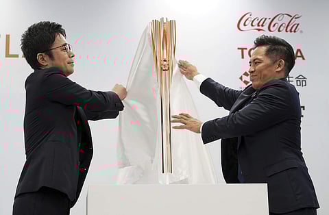 The Olympic torch of the Tokyo 2020 Olympic Games is unveiled during a press conference in Tokyo (Photo | AP)