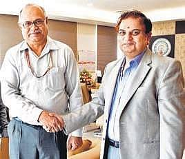SCR GM Gajanan Mallya with Chief Secretary Anil Chandra Punetha | Express