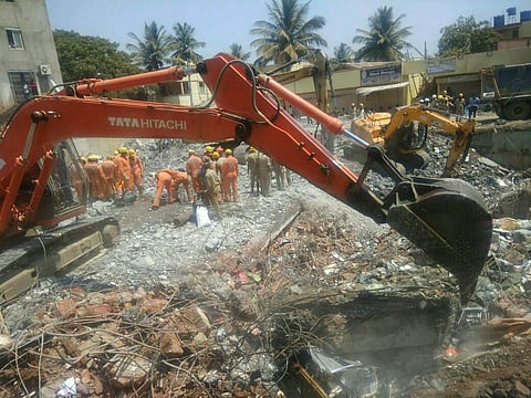 Rescue operations underway at the site of Dharwad building collapse. (Photo | EPS)