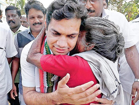 UDF candidate Hibi Eden embracing an old lady during his visit at Vaduthala on Saturday | ARUN ANGELA
