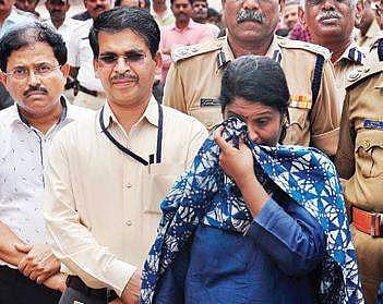 DC Deepa Cholan breaks down at the building crash site on Monday | Express