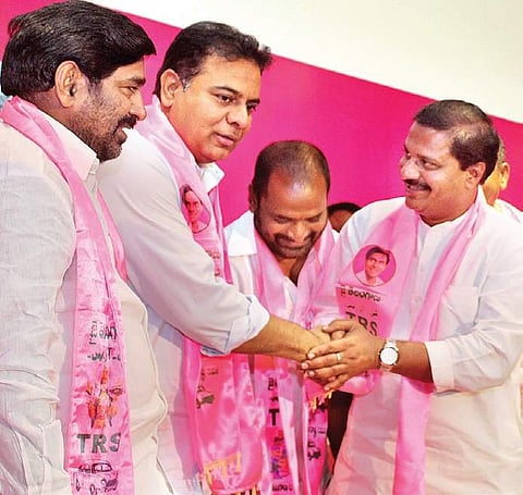 Former Congress MLA and DCC president Bikshamaiah Goud being inducted in TRS by party working president KT Rama Rao on Tuesday | Express