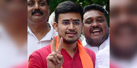 BJP Lok Sabha Candidate from Bangalore South Tejasvi Surya showing victory sign after filing his nomination for Lok Sabha elections at Jayanagar in Bengaluru. (EPS|Shriram)