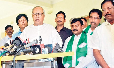 Subas Chauhan with BJD supremo Naveen Patnaik in Bhubaneswar. (Photo | EPS)