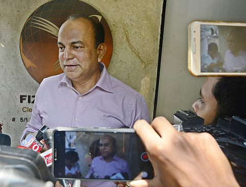 Bengaluru MLC BM Farooq arrives at his office in Residency Road in Bengaluru as I-T officials conducts raid at his premises on Thursday. | Shriram BN