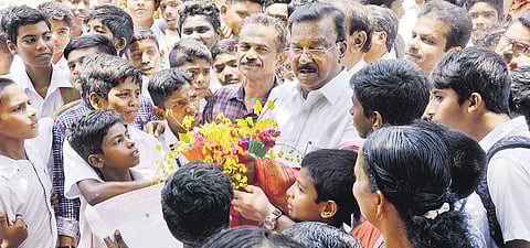 Students welcoming CPI candidate C Divakaran during his campaign complying to the green protocol. | Vincent Pulickal
