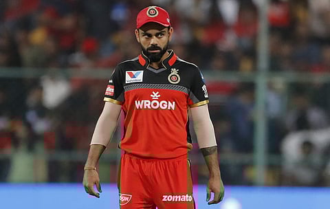 An angry RCB captain Virat Kohli came down heavily on ICC Elite Panel Umpire S Ravi after the final delivery of the match (Photo | AP)