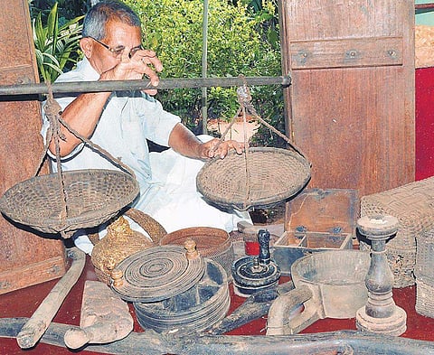 Chidanand Hegde with his collection of antique articles | D Hemanth