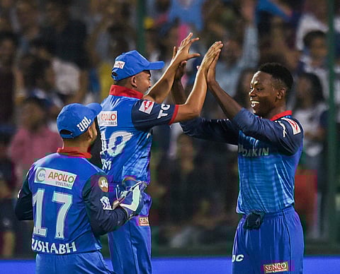 Kagiso Rabada celebrates with teammates Prithvi Shaw and Rishabh Pant. (Photo | PTI)