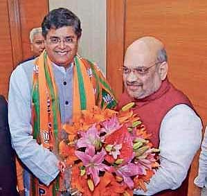 BJP president Amit Shah welcomes Baijayant Panda at party office in New Delhi on Monday | naveen kumar