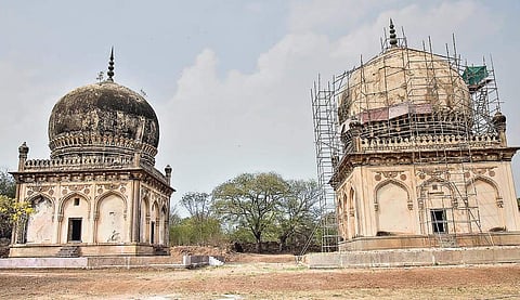 Premamati Tomb (R) is covered in scaffolds with the Taramati Tomb seen next to it in Qutb Shahi Tomb complex in Hyderabad on Monday | Vinay Madapu