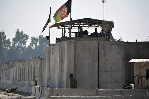 An Afghan security personnel stand guard in the checkpoint of airport after a suicide attack in Jalalabad province, east of Kabul, Afghanistan. (Photo | AP)