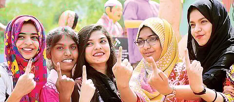 Young voters take part in an event held to mark National Voters’ Day, at Town Hall in Bengaluru on Friday | Pandarinath B