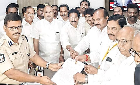 TDP leaders submitting a complaint against some senior Telangana police officials and YSRC leaders to Guntur Rural SP SV Rajasekhara Babu on Wednesday | Express