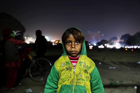 Someday, the family says, the 7-year-old Farmaan will save them. | AP