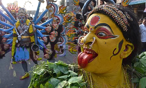 Folk artistes perform the Bethala dance during Rathotsavam after the third day of Shivaratri, in Vijayawada, Andhra Pradesh. (Photo | P Ravindra Babu, EPS)