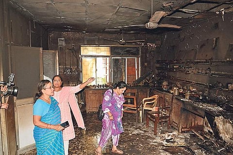 Officials of SCBMCH inspecting the fire mishap site at pathology department on Friday | Express