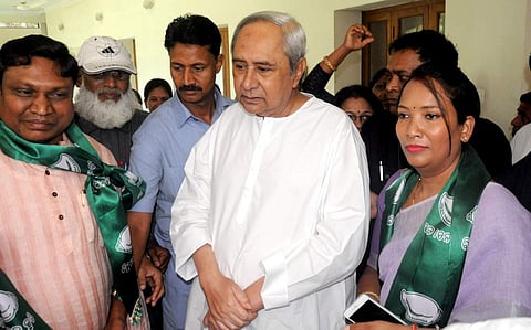 Sunita Biswal with the  the Odisha Chief Minister Naveen Patnaik. (Photo | EPS)
