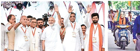 Prime Minister Narendra Modi, BJP state president BS Yeddyurappa, party leaders SM Krishna, Srinivasa Prasad and others wave to the public at a rally in Mysuru  on Tuesday| Udayashankar S