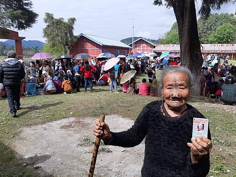 An old woman on her way to cast her vote in Arunachal Pradesh (Photo| Special arrangement)