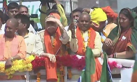 Chief Minister Yogi Adityanath and BJP Lok Sabha candidate from Amethi, Smriti Irani hold a roadshow in Amethi. (Twitter)