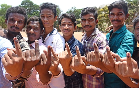 First time voters showing their ink marked fingers after casting their votes at PB Siddhartha college in Vijayawada on Thursday. (Photo | P Ravindra Babu, EPS)