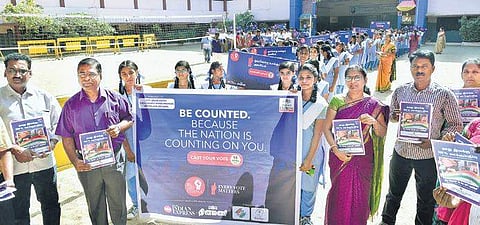 Students of Durgadevi Choudhary Vivekananda Vidyalaya take out a procession as part of a vote awareness campaign launched by TNIE, at Kolattur in the city on Thursday| P Jawahar