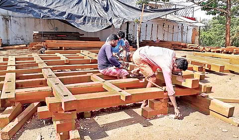 Carpenters engaged in construction of platform for chariots in Koraput on Monday