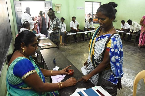A woman cast her vote at Pallavaram cantonment school, Chennai. (Photo | Ashwin Prasath, EPS)