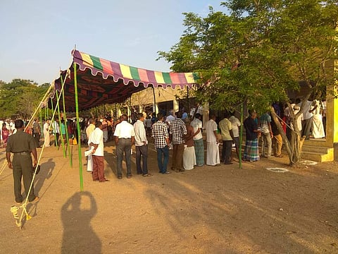 People standing in a queue to cast their votes. (Photo | EPS)