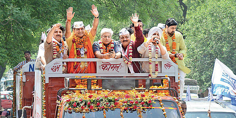 AAP candidate Balbir Singh Jakhar (2nd from left) holds a road show before filling his nomination for West Delhi Lok Sabha seat on Thursday | Naveen Kumar