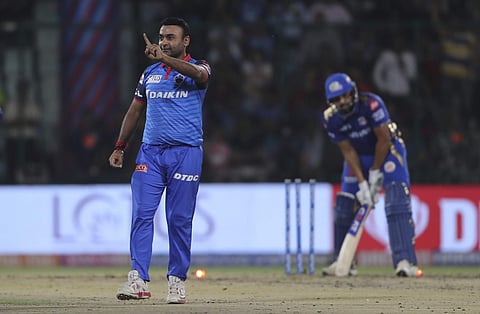 Delhi Capitals spinner Amit Misra celebrates the wicket of Mumbai Indians captain Rohit Sharma (Photo | AP)