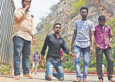 PK Fayaz, a Jana Sena activist from Guntur East constituency, walking on his knees to Durga temple in Vijayawada on Monday with a wish to see Pawan Kalyan as Chief Minister of the State (Photo | P Ravindra Babu/EPS)