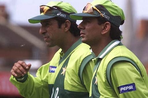 Wasim Akram(L) with Saqlain Mushtaq. (FIle | AFP)