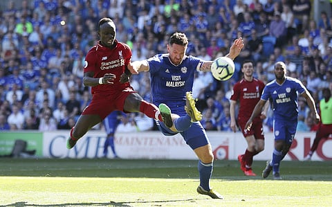 Liverpool back on top with win at Cardiff