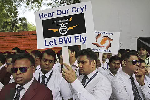 Jet Airways employees gather to appeal to the government to save their company, in New Delhi. (Photo | AP)
