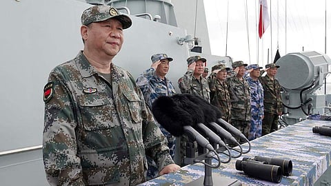 Chinese President Xi Jinping reviewing the Chinese People's Liberation Army Navy fleet in the South China Sea. (Photo | AP)